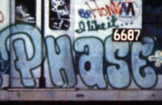 Graffiti Writing on a Train