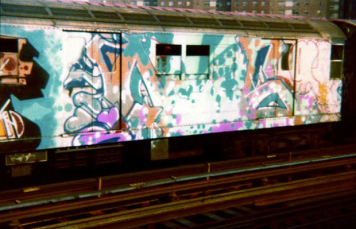Graffiti Writing on a Train