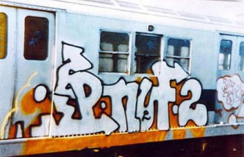 Graffiti Writing on a Train